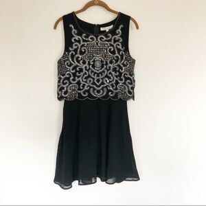 Francesca’s sequin pop-over dress Black Sz M